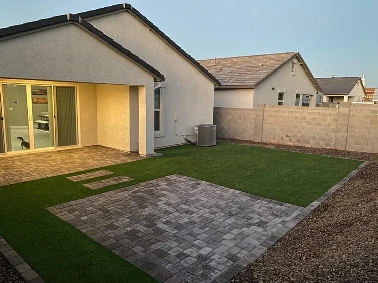 Backyard turf with paver patio